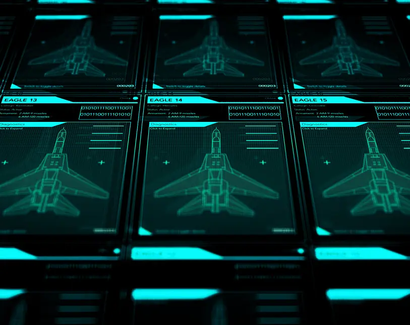 Futuristic aircraft schematics on digital screens.